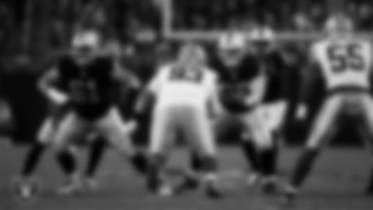 Las Vegas Raiders center/guard Jordan Meredith (61) and center Will Putnam (67) block during the regular season home game against the Dallas Cowboys at Allegiant Stadium.