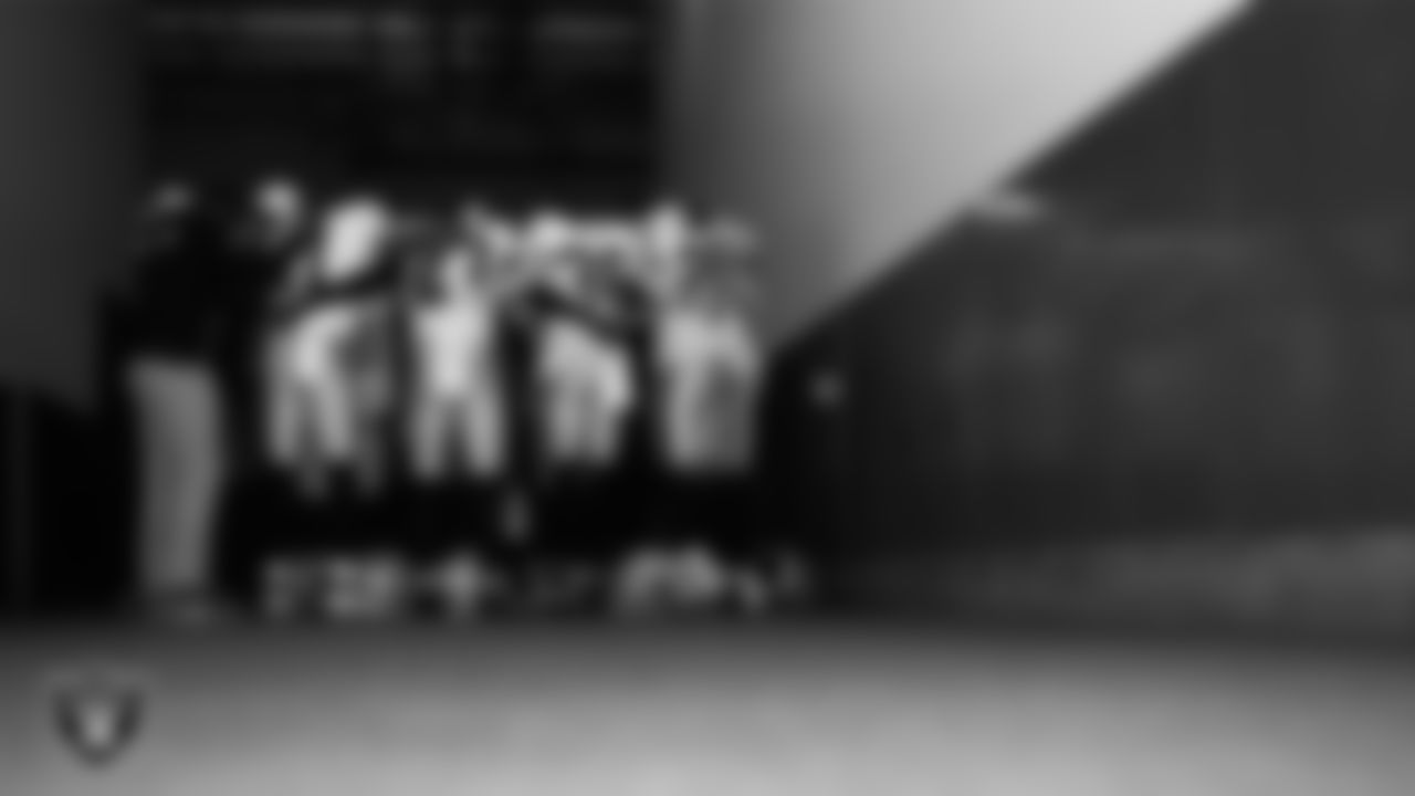 The Las Vegas Raiders defensive backs huddle in the tunnel before the regular season away game against the Los Angeles Chargers at SoFi Stadium.