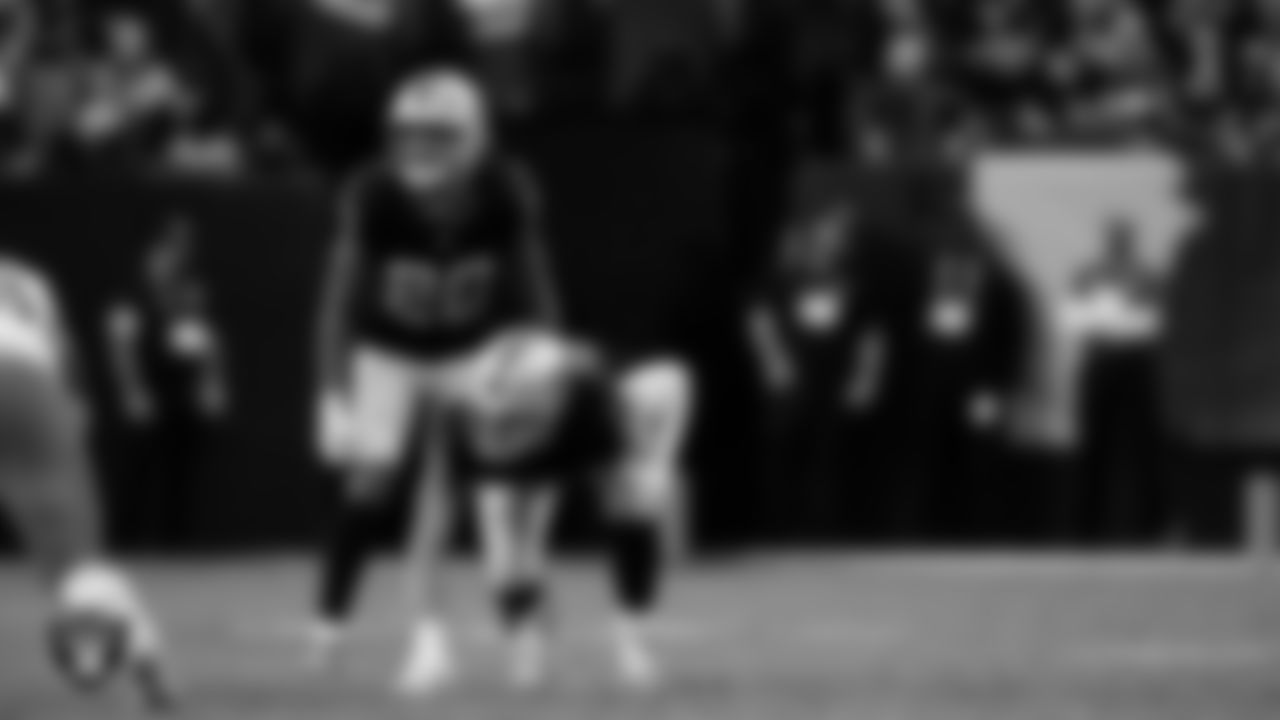 Las Vegas Raiders safety Isaiah Pola-Mao (20) and defensive end Maxx Crosby (98) during the regular season home game against the Cleveland Browns at Allegiant Stadium.