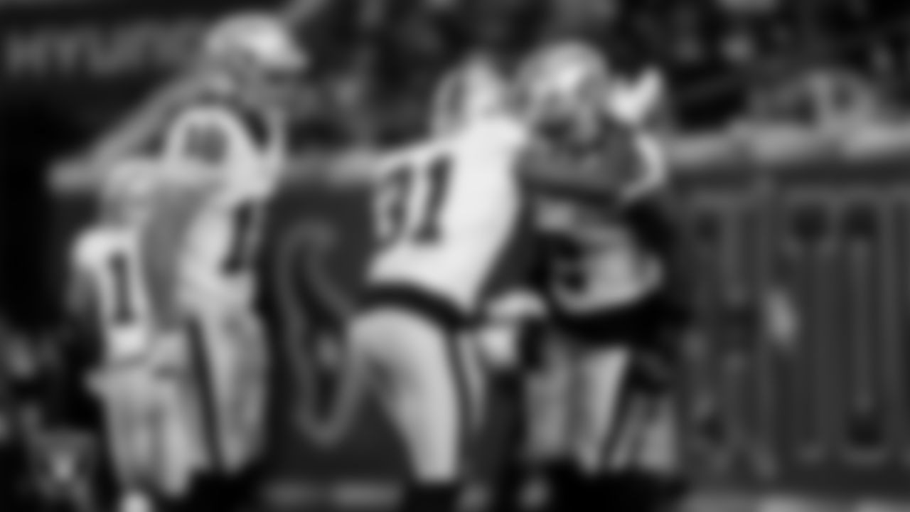 Las Vegas Raiders running back Ashton Jeanty (2) celebrates with teammates after making a 60-yard touchdown catch during the regular season away game against the Houston Texans at NRG Stadium.