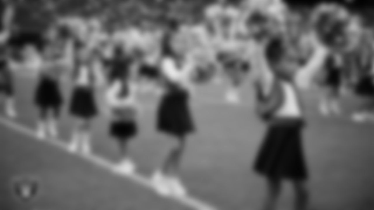 Junior Raiderettes perform on the field before the preseason home game against the San Francisco 49ers at Allegiant Stadium.