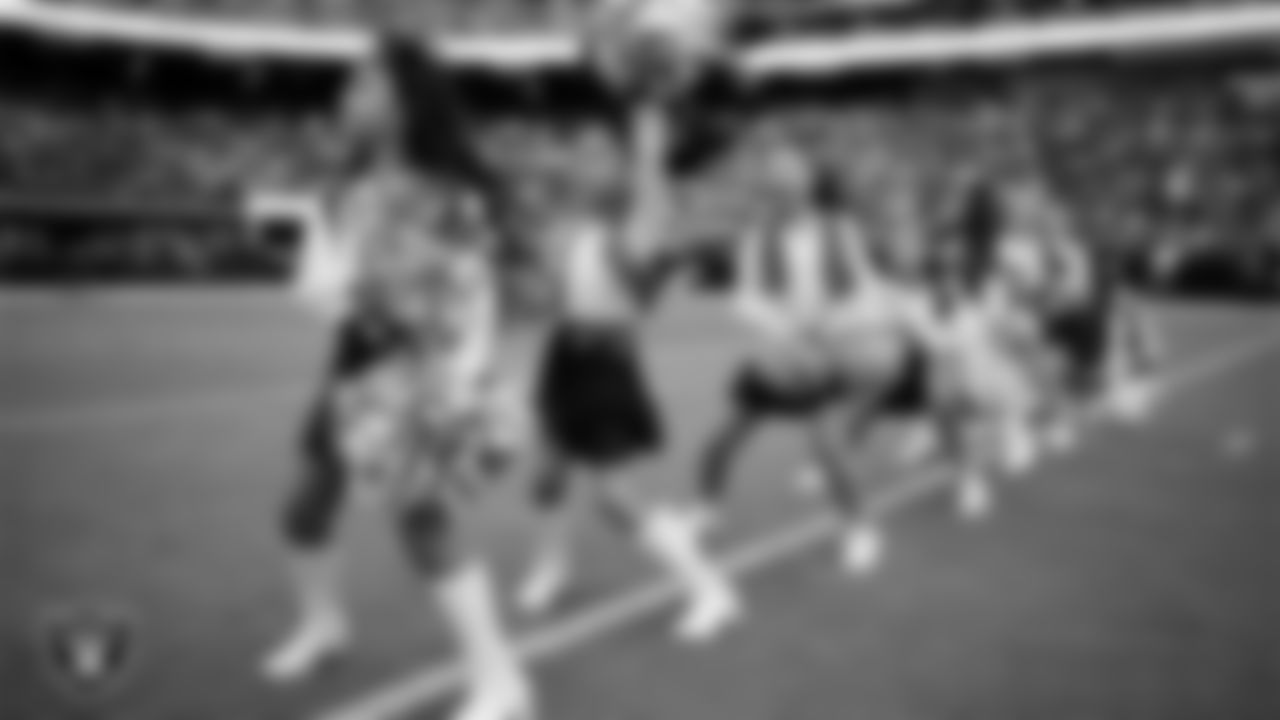 Junior Raiderettes perform on the field before the preseason home game against the San Francisco 49ers at Allegiant Stadium.
