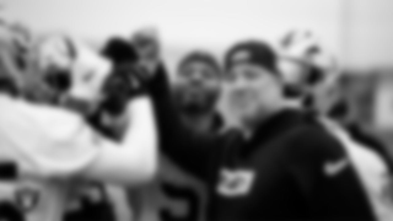 Las Vegas Raiders linebacker Elandon Roberts (52) in huddle during practice at Intermountain Health Performance Center.