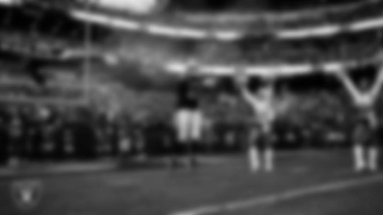 Las Vegas Raiders defensive tackle Adam Butler (69) is introduced onto the field before the regular season home game against the Tennessee Titans at Allegiant Stadium.