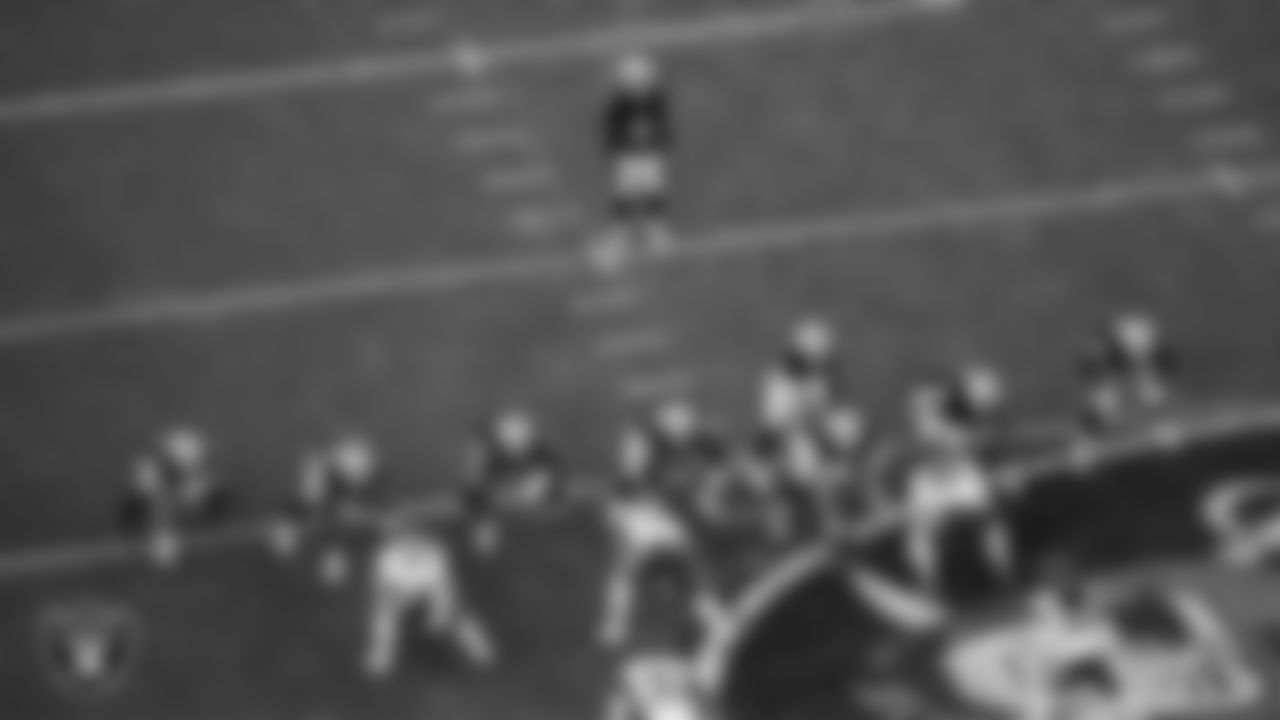 The Las Vegas Raiders offense lines up before the snap during the regular season home game against the Kansas City Chiefs at Allegiant Stadium.