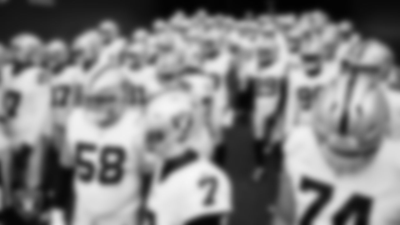 The Las Vegas Raiders wait to be introduced onto the field before the preseason away game against the Seattle Seahawks at Lumen Field.