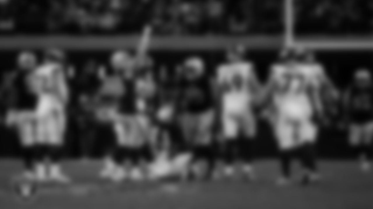 Las Vegas Raiders defensive end Maxx Crosby (98) celebrates after sacking the quarterback during the regular season home game against the Denver Broncos at Allegiant Stadium.