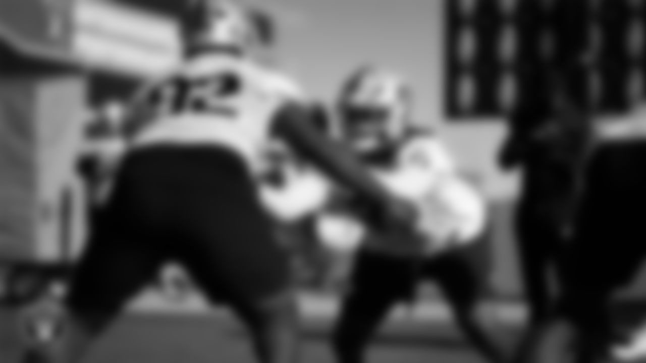 Las Vegas Raiders defensive tackle JJ Pegues (92) and defensive tackle Tonka Hemingway (97) during practice at Intermountain Health Performance Center.