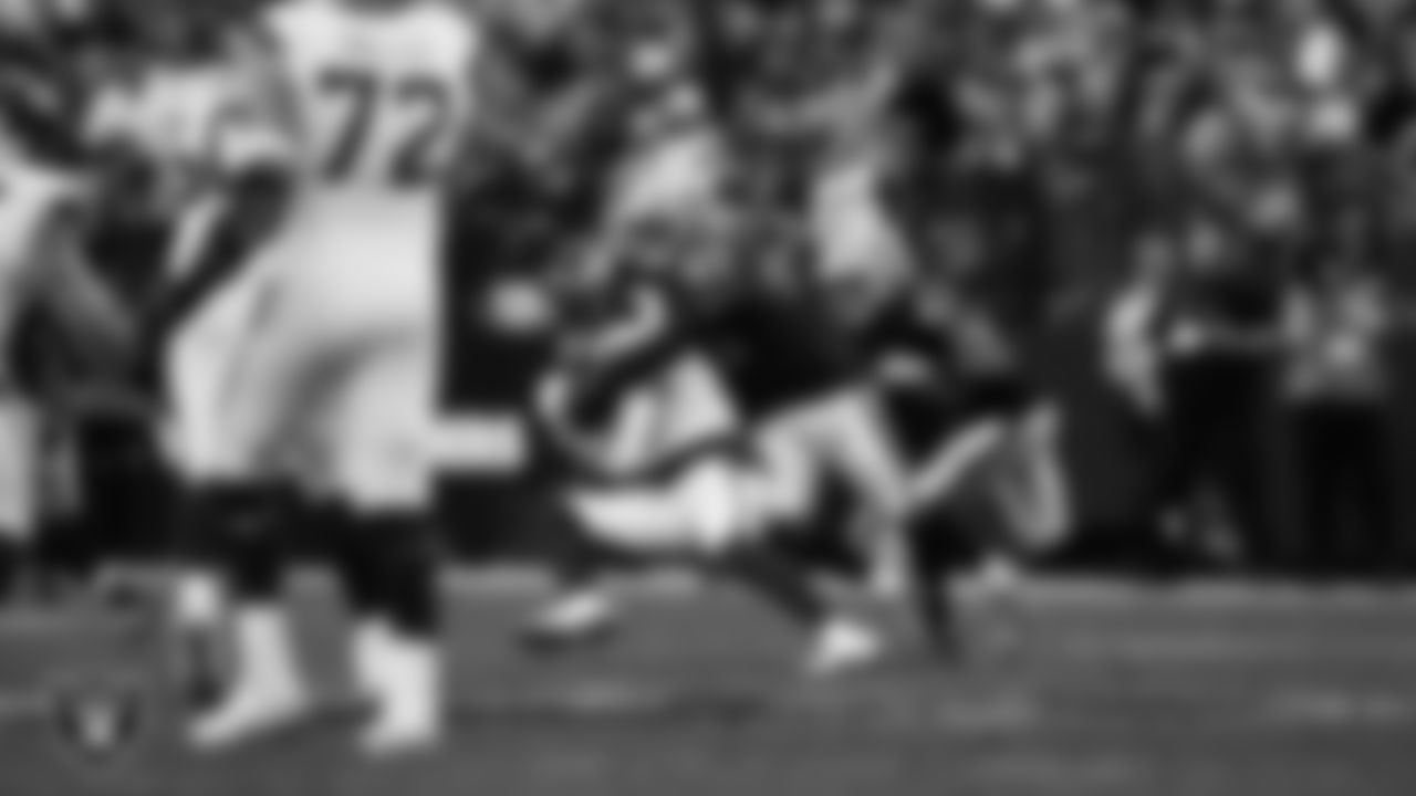 Las Vegas Raiders linebacker Devin White (45) makes a tackle during the regular season home game against the Denver Broncos at Allegiant Stadium.