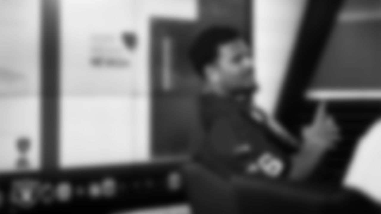 Las Vegas Raiders guard Caleb Rogers (76) works with representatives from Hope Means Nevada and designers to design cleats for My Cause My Cleats in Cox Studios at Intermountain Health Performance Center.