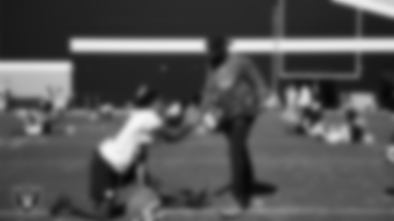 Las Vegas Raiders cornerback Greedy Vance (41) and defensive quality control coach Beyah Rasool during practice at Intermountain Health Performance Center.