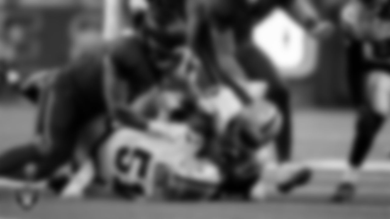 Las Vegas Raiders defensive end Malcolm Koonce (51) and linebacker Elandon Roberts (52) during the regular season away game against the Houston Texans at NRG Stadium.