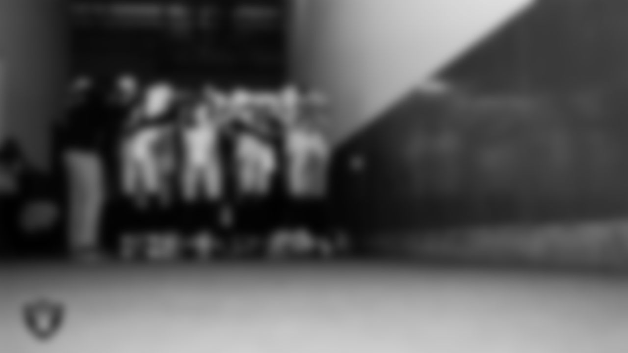 The Las Vegas Raiders defensive backs huddle in the tunnel before the regular season away game against the Los Angeles Chargers at SoFi Stadium.