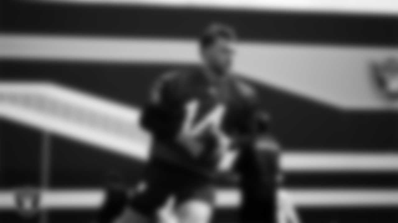 Las Vegas Raiders quarterback Carter Bradley (14) at a workout during phase two of the offseason program at Intermountain Health Performance Center.