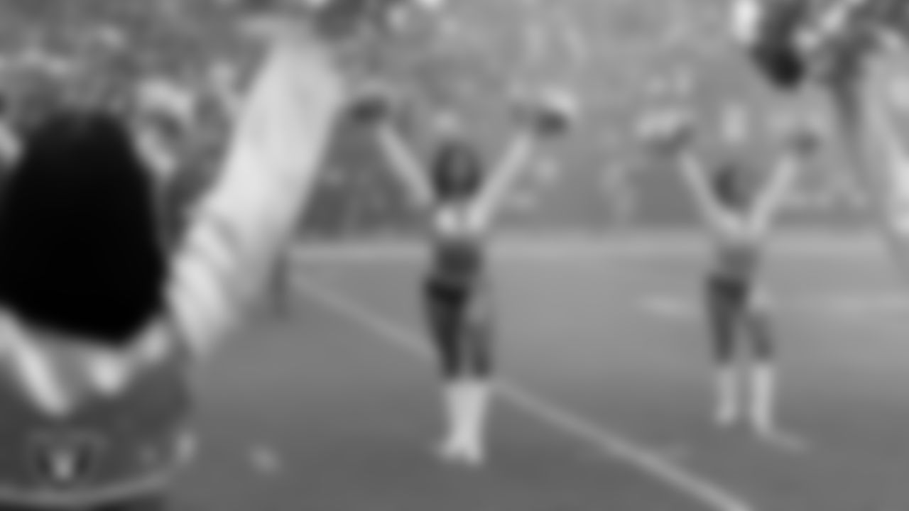 Raiderette Kylee during player introductions before the preseason home game against the San Francisco 49ers at Allegiant Stadium.