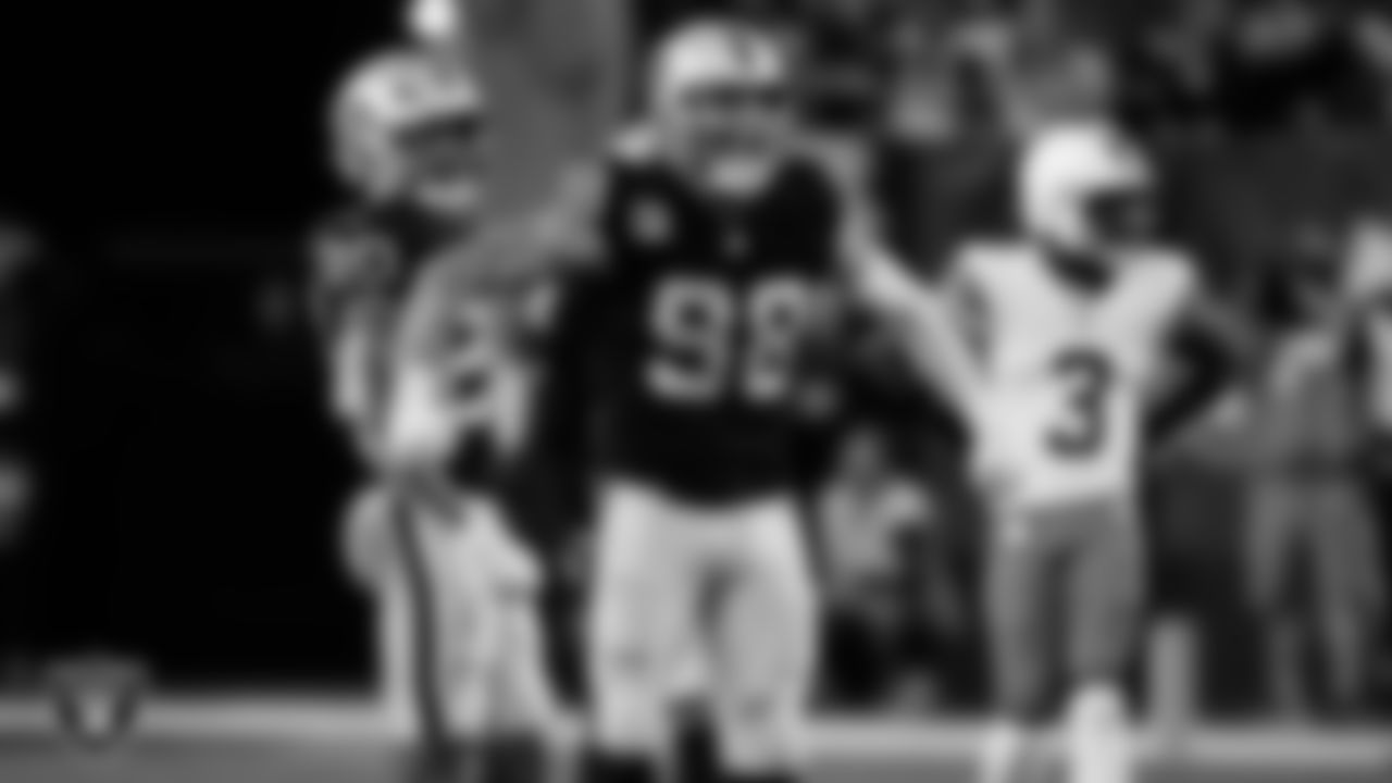 Las Vegas Raiders defensive end Maxx Crosby (98) celebrates after making a tackle during the regular season home game against the Cleveland Browns at Allegiant Stadium.