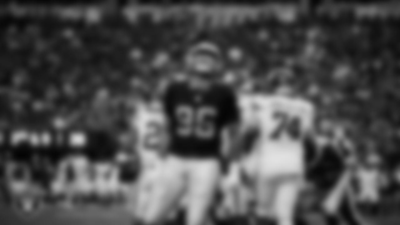 Las Vegas Raiders defensive tackle Jonah Laulu (96) celebrates after making a tackle during the regular season home game against the New York Giants at Allegiant Stadium.