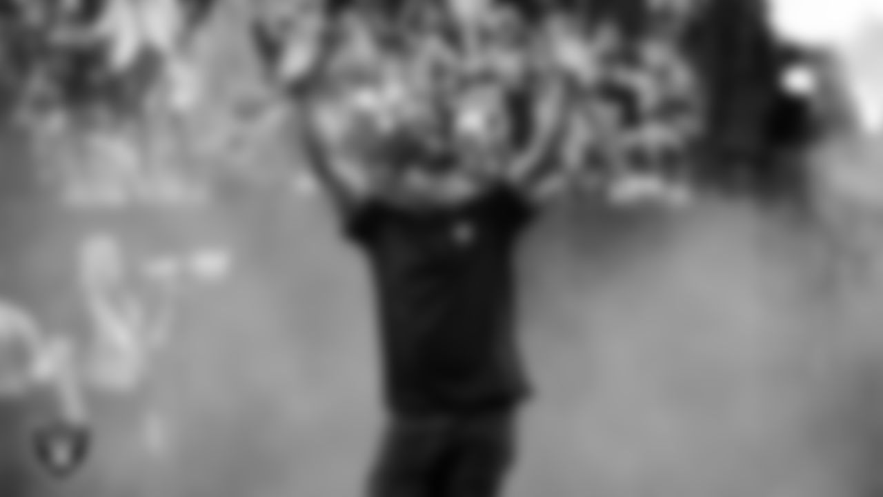 United States Marine Corps Veteran Phellep Snow is honored during a Salute to Service moment during the regular season home game against the Cleveland Browns at Allegiant Stadium.