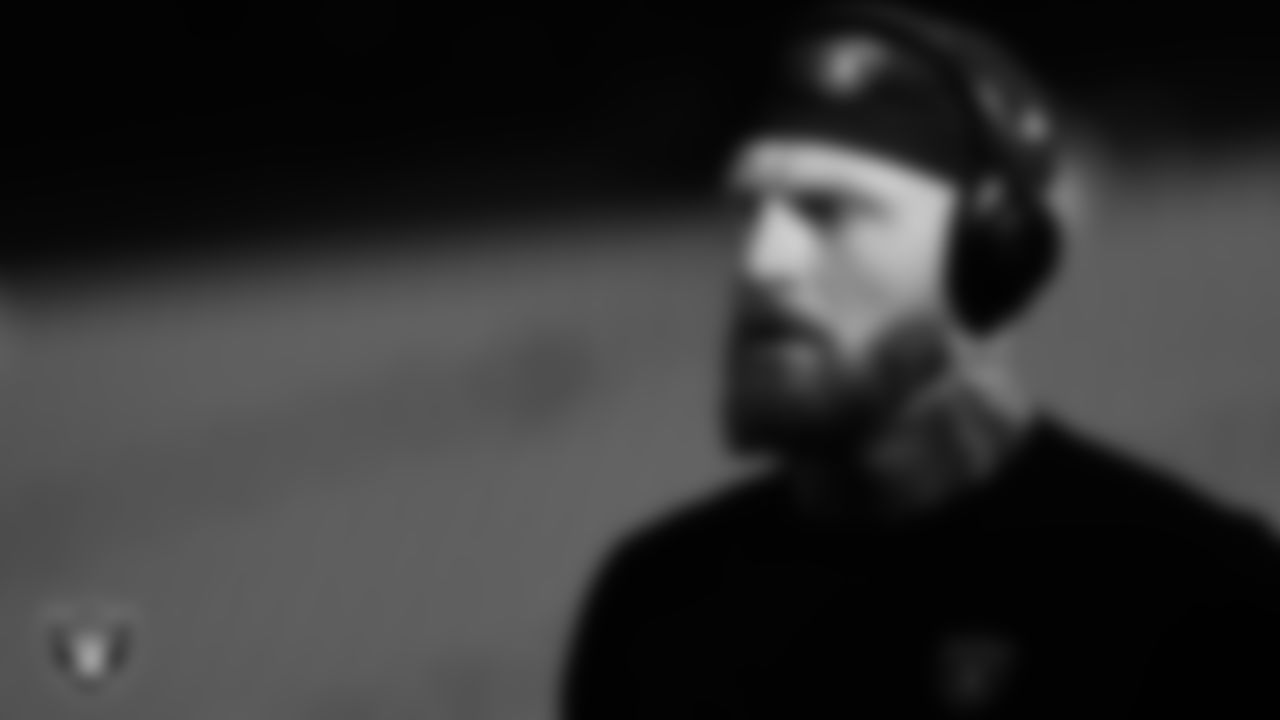 Las Vegas Raiders defensive end Maxx Crosby (98) warming up before the regular season away game against the Kansas City Chiefs at GEHA Field at Arrowhead Stadium.