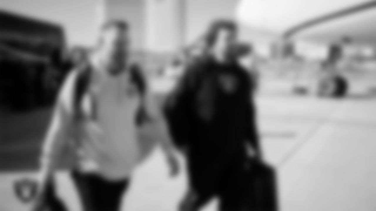Las Vegas Raiders tight ends coach Luke Steckel and assistant offensive line coach Andy Dickerson depart for the regular season away game against the Kansas City Chiefs.