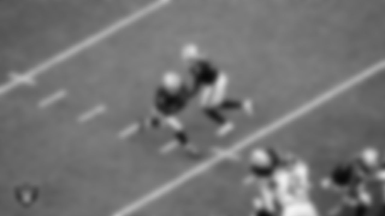 Las Vegas Raiders running back Ashton Jeanty (2) and quarterback Geno Smith (7) during the regular season home game against the Tennessee Titans at Allegiant Stadium.
