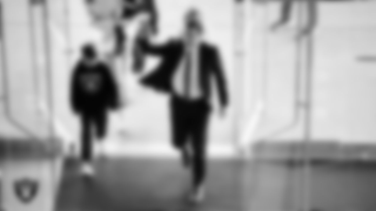 Las Vegas Raiders Head Coach Klint Kubiak is welcomed by alumni, players and staff to Intermountain Health Performance Center.