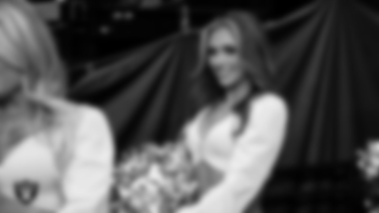 Raiderette Shelby walks through the tunnel before the regular season home game against the Kansas City Chiefs at Allegiant Stadium.