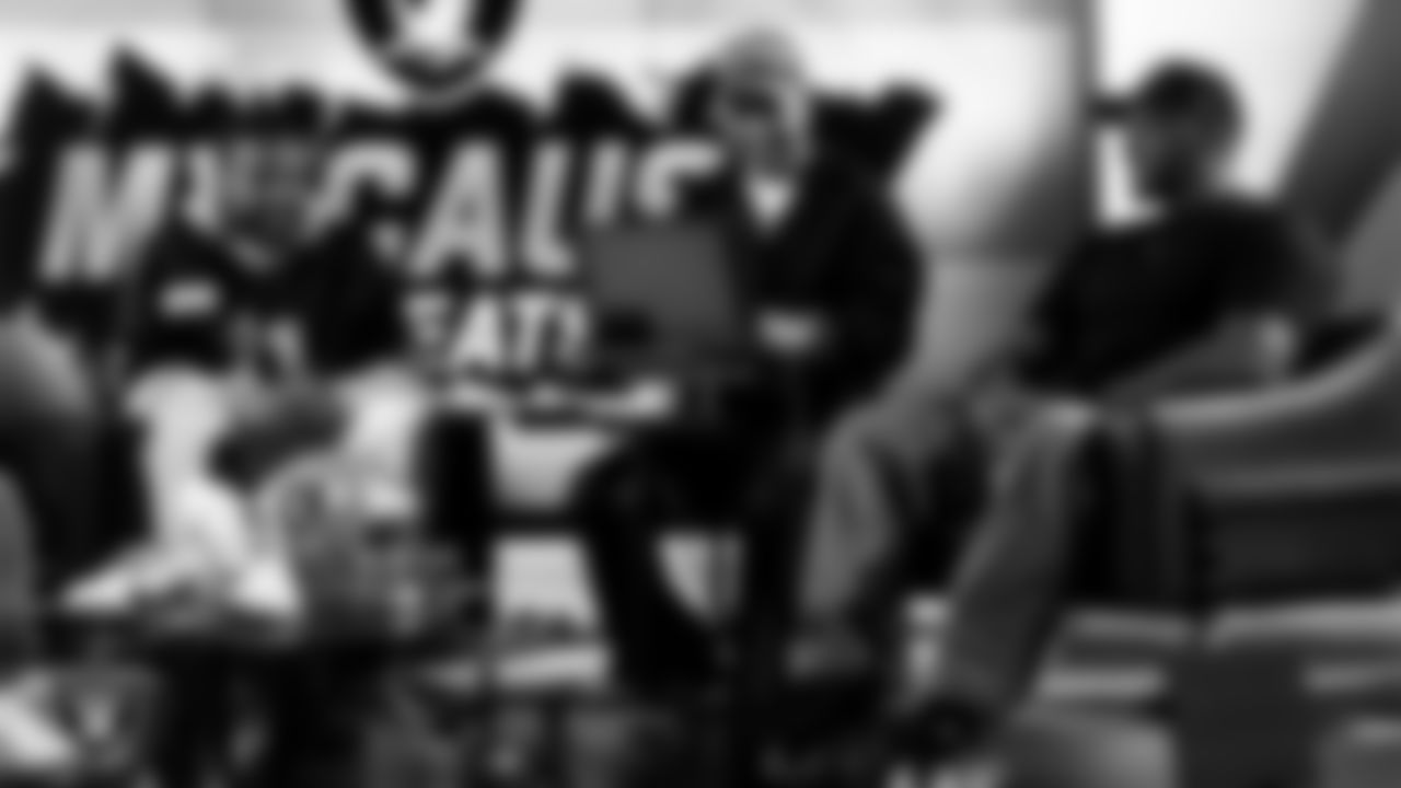 Las Vegas Raiders safety Jeremy Chinn (11) works with representatives from the Raiders Silver & Black League and designers to design cleats for My Cause My Cleats in Cox Studios at Intermountain Health Performance Center.