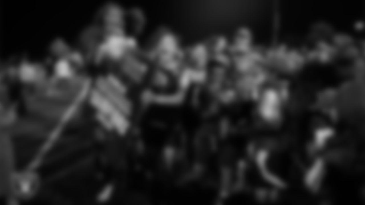 The Johnson Junior High School girls flag football team celebrates after winning a 2025 Middle School Flag Football Championship game at All American Park.