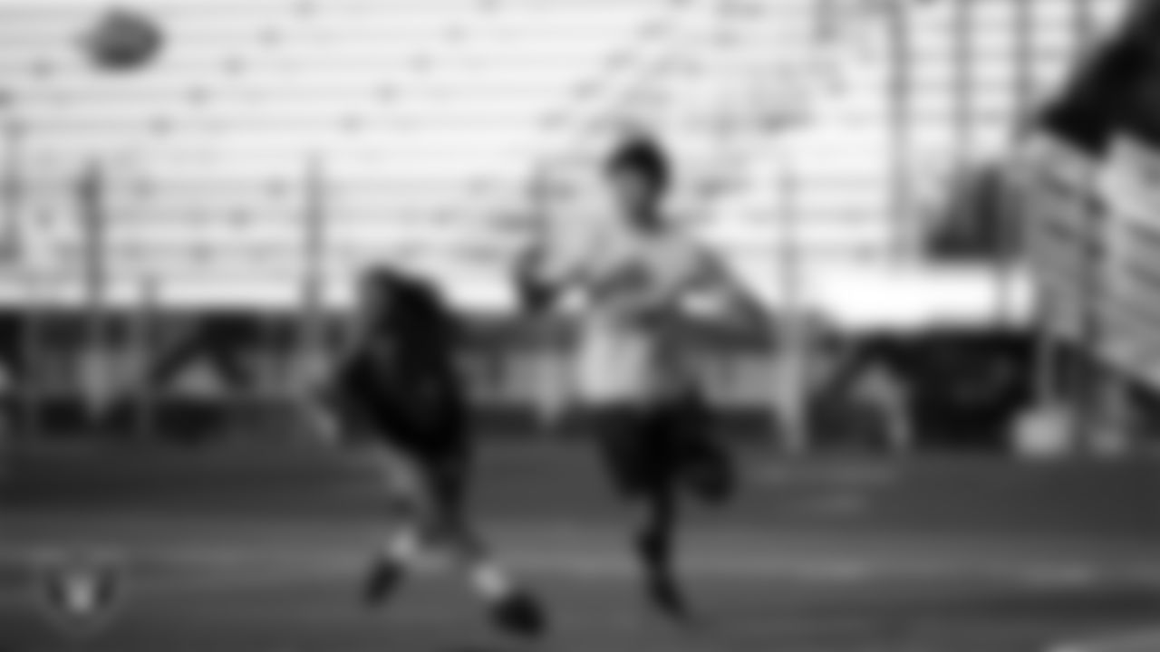 Athletes participate in a drill during a Raiders Prospect Camp at Eldorado High School.
