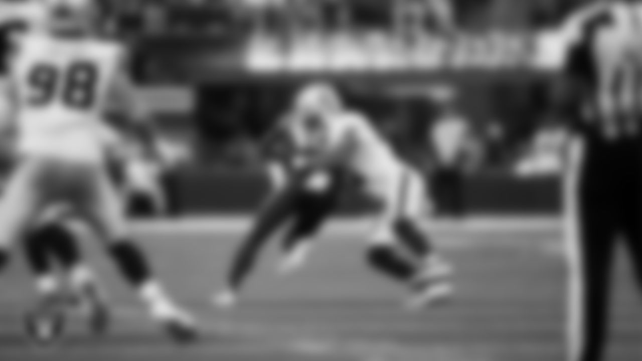 Las Vegas Raiders safety Jeremy Chinn (11) makes a tackle during the regular season away game against the Los Angeles Chargers at SoFi Stadium.