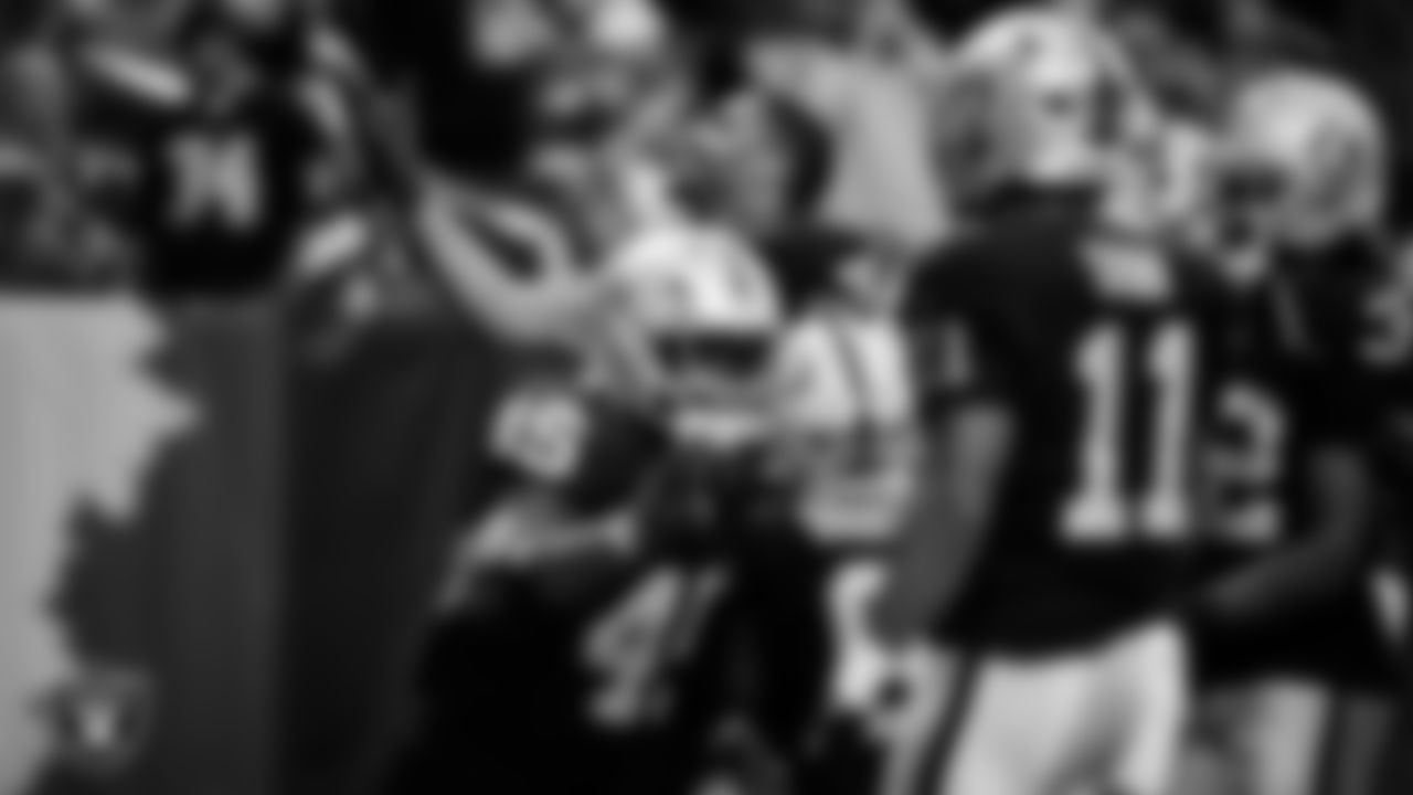 Las Vegas Raiders defensive end Charles Snowden (49) celebrates after making an interception during the regular season home game against the Cleveland Browns at Allegiant Stadium.