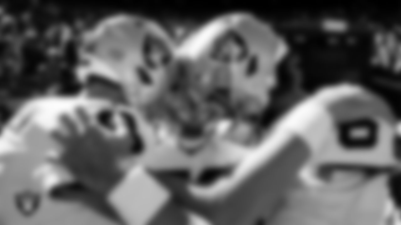 The Las Vegas Raiders special teams unit huddles before the regular season away game against the Kansas City Chiefs at GEHA Field at Arrowhead Stadium.