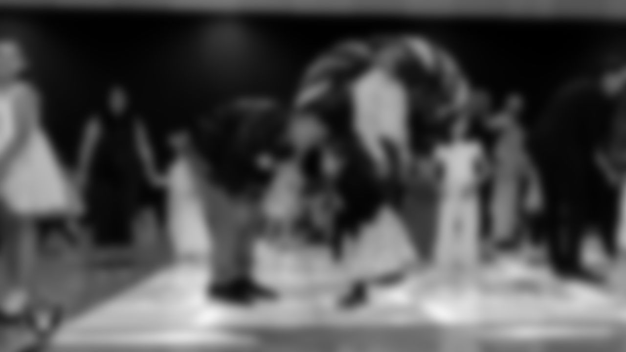 Attendees learn a dance during the Valentine's Day Dance at The Studio.