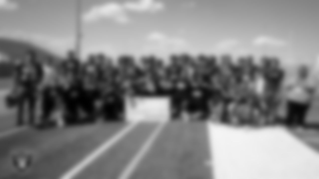The Silverado High School football team poses for a photo during practice at Silverado High School.