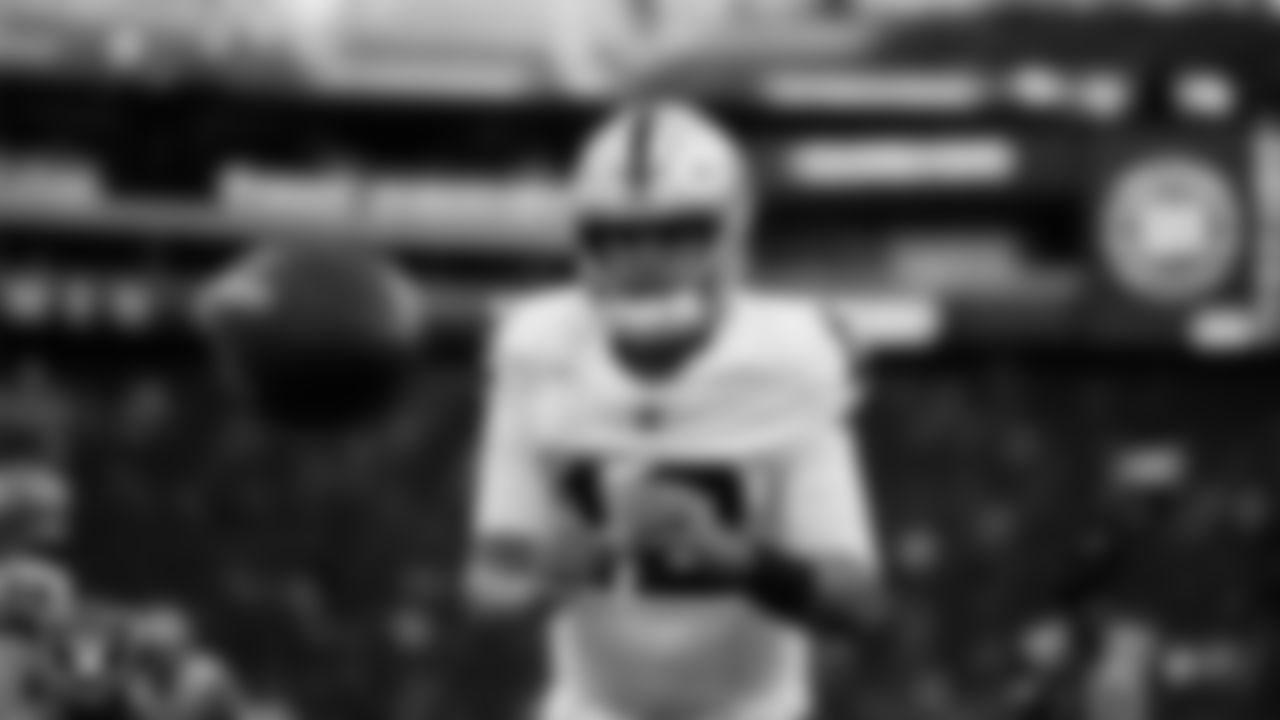 Las Vegas Raiders quarterback Aidan O'Connell (12) warming up before the preseason away game against the Seattle Seahawks at Lumen Field.