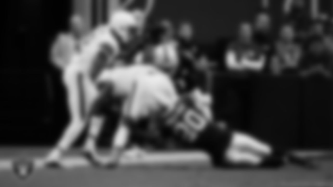 Las Vegas Raiders safety Isaiah Pola-Mao (20) makes a tackle during the regular season home game against the Cleveland Browns at Allegiant Stadium, Sunday, September 29, 2024, in Las Vegas, Nev.