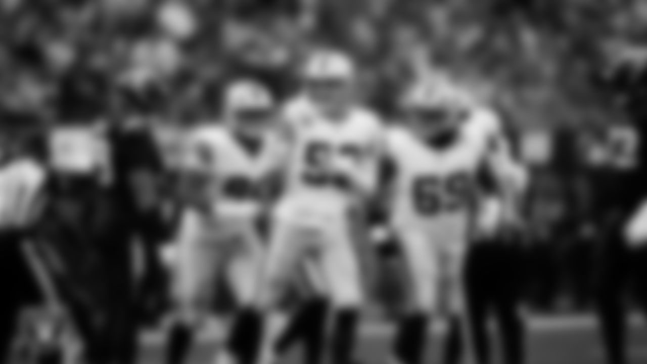Las Vegas Raiders defensive end Maxx Crosby (98) celebrates after sacking the quarterback during the regular season away game against the Los Angeles Chargers at SoFi Stadium.