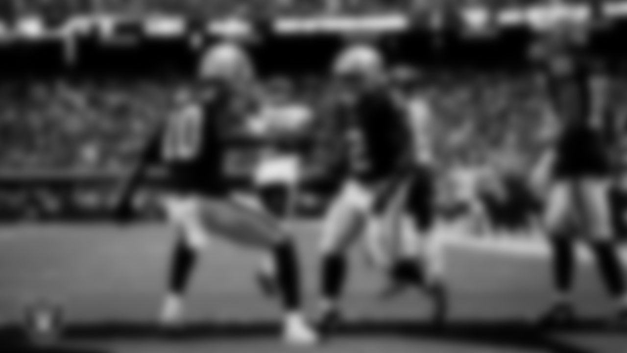 Las Vegas Raiders running back Ashton Jeanty (2) celebrates with wide receiver Dont'e Thornton Jr. (10) after making an 8-yard touchdown catch during the regular season home game against the Chicago Bears at Allegiant Stadium.