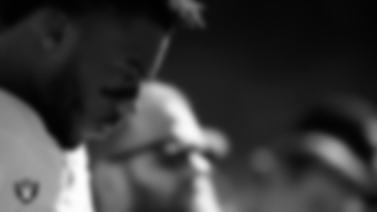 Las Vegas Raiders defensive end Malcolm Koonce (51) during the national anthem before the regular season away game against the Kansas City Chiefs at GEHA Field at Arrowhead Stadium.