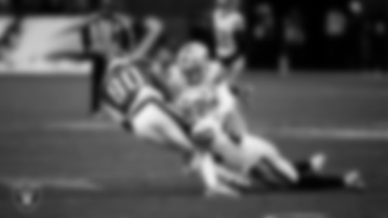 Las Vegas Raiders safety Isaiah Pola-Mao (20) makes a tackle during the regular season away game against the Philadelphia Eagles at Lincoln Financial Field.