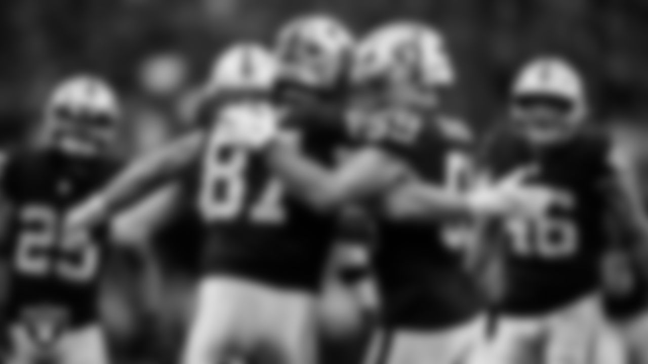 Las Vegas Raiders tight end Michael Mayer (87) celebrates with linebacker Jon Rhattigan (59) after making a tackle during the regular season home game against the Jacksonville Jaguars at Allegiant Stadium.