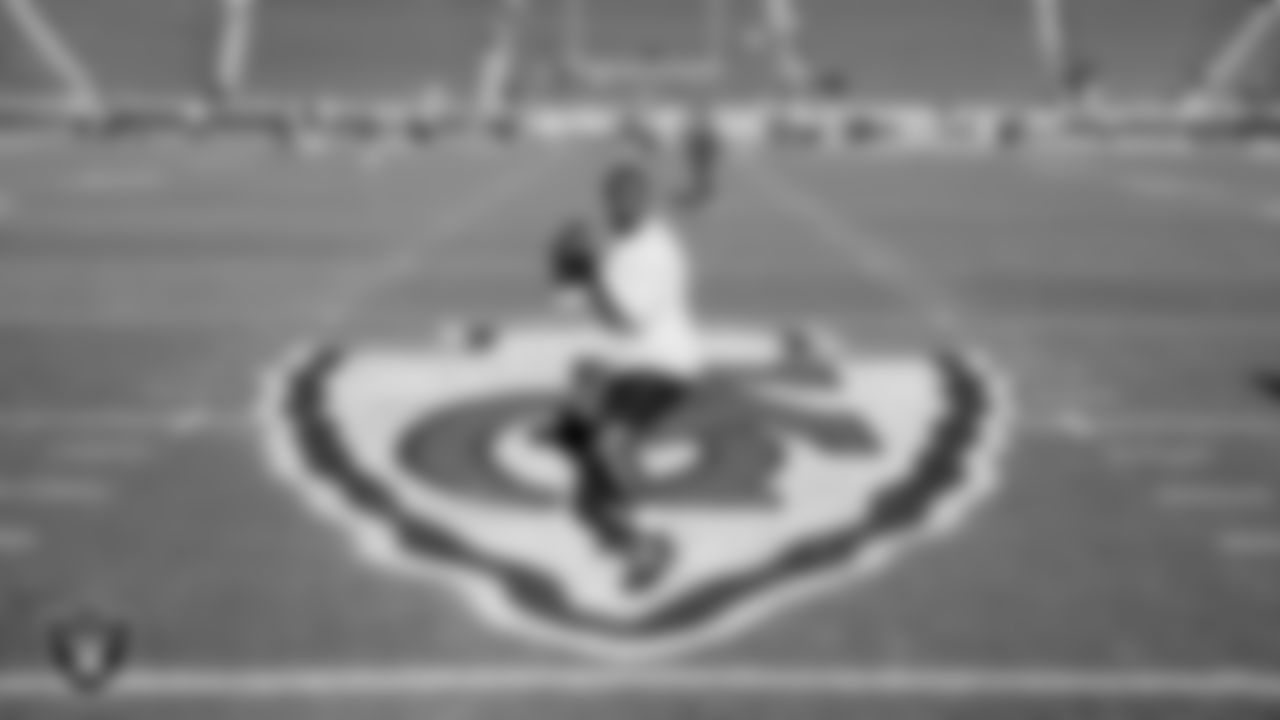 Las Vegas Raiders quarterback Geno Smith (7) warming up before the regular season away game against the Kansas City Chiefs at GEHA Field at Arrowhead Stadium.