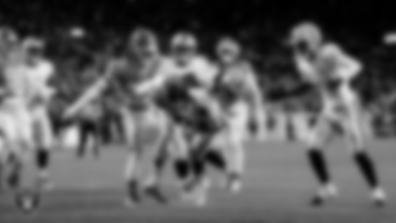 Las Vegas Raiders running back Ashton Jeanty (2) rushes for a 4-yard touchdown during the regular season away game against the Denver Broncos at Empower Field at Mile High.