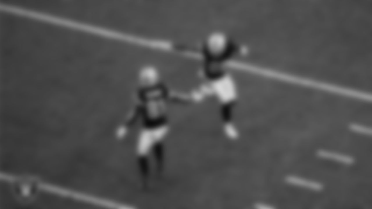 Las Vegas Raiders wide receiver Alex Bachman (81) celebrates with wide receiver Justin Shorter (88) after returning a punt during the regular season home game against the Tennessee Titans at Allegiant Stadium.