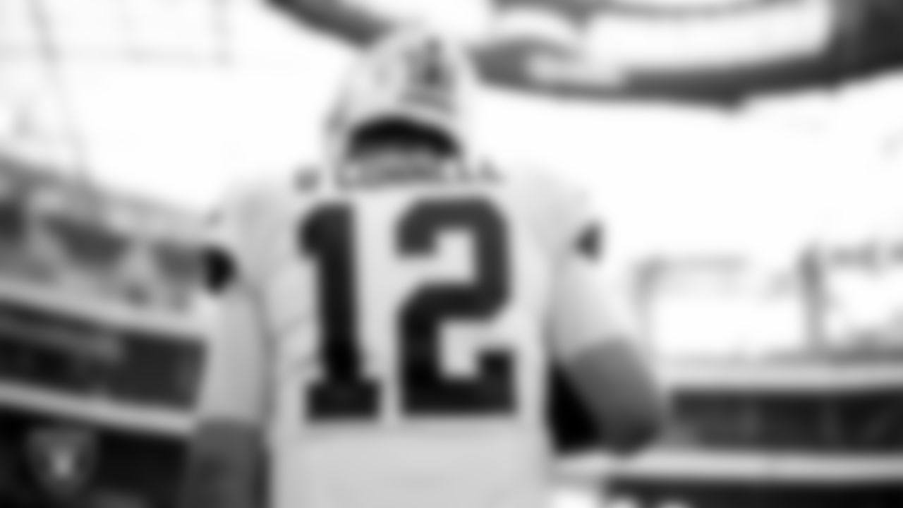 Las Vegas Raiders quarterback Aidan O'Connell (12) warming up before the regular season away game against the Los Angeles Chargers at SoFi Stadium.