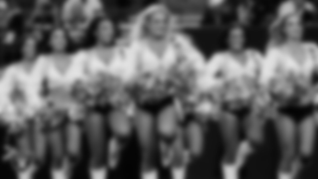Raiderette Pip walks onto the field for a performance during the regular season home game against the Jacksonville Jaguars at Allegiant Stadium.