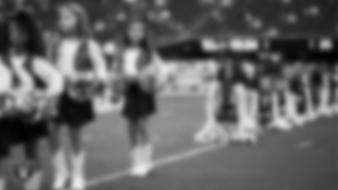 Junior Raiderettes perform on the field before the preseason home game against the San Francisco 49ers at Allegiant Stadium.