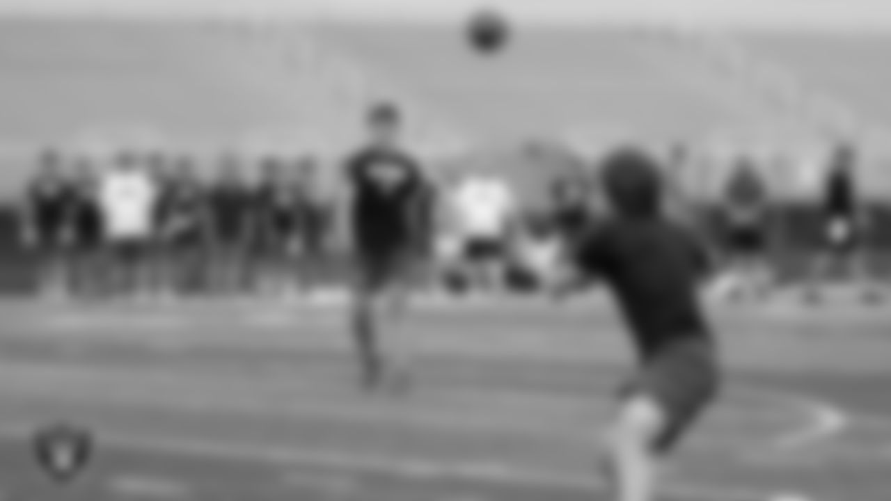 Athletes compete in a 7-on-7 game during a Las Vegas Raiders 11-ON event at Damonte Ranch High School.