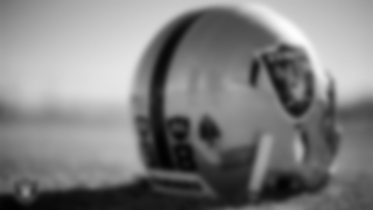 Las Vegas Raiders defensive end Maxx Crosby's (98) helmet on the field during practice at Intermountain Health Performance Center.